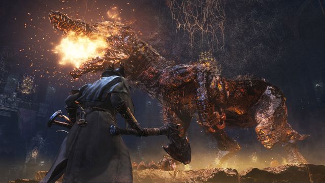 A character with an ax is attacked by a huge dragon in Bloodborne