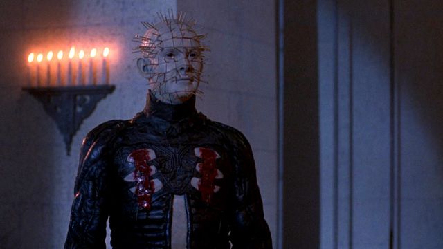 Hellraiser 3: Hell on Earth: Pinhead walks in a cathedral lit by candles