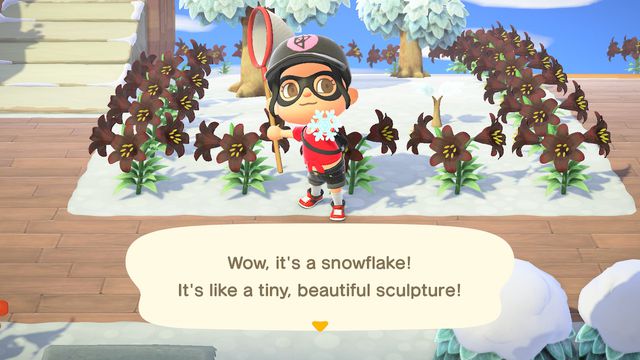 An Animal Crossing villager holds up a snowflake
