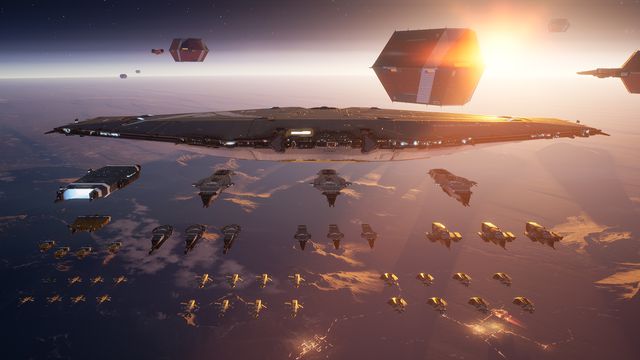 A massive capital ship and a fleet of fighters prepare for battle.